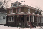 125 S MONROE ST, a American Foursquare house, built in Stoughton, Wisconsin in 1915.
