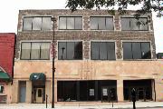 118 S ADAMS ST, a Commercial Vernacular automobile showroom, built in Green Bay, Wisconsin in 1924.