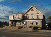 1605 UNIVERSITY AVE, a Front Gabled tavern/bar, built in Green Bay, Wisconsin in 1899.
