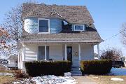 352 N HARRISON ST, a Queen Anne house, built in Lancaster, Wisconsin in 1900.