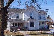 450 N HARRISON ST, a Gabled Ell house, built in Lancaster, Wisconsin in 1910.