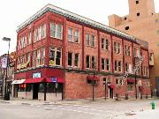227-229 N WASHINGTON ST, a Commercial Vernacular large retail building, built in Green Bay, Wisconsin in 1887.