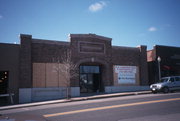 213 N CASCADE ST, a Commercial Vernacular automobile showroom, built in Osceola, Wisconsin in 1917.