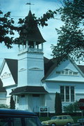 W CNR OF W 4TH ST AND IOWA AVE, a Shingle Style church, built in Hayward, Wisconsin in 1889.