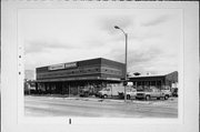 420 S 1ST ST, a International Style automobile showroom, built in Milwaukee, Wisconsin in 1947.
