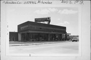 420 S 1ST ST, a International Style automobile showroom, built in Milwaukee, Wisconsin in 1947.