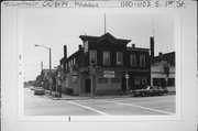 1100-1102 S 1ST ST, a Boomtown retail building, built in Milwaukee, Wisconsin in 1890.