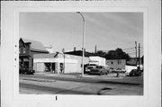 1434 S 1ST ST, a Commercial Vernacular automobile showroom, built in Milwaukee, Wisconsin in 1941.