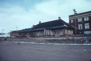 BETWEEN STATE & BROADWAY BY RR TRACKS, a Craftsman depot, built in Medford, Wisconsin in 1913.