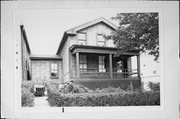 418 S 4TH ST, a Greek Revival house, built in Milwaukee, Wisconsin in 1846.