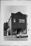 817-819 S 5TH ST, a Boomtown retail building, built in Milwaukee, Wisconsin in 1868.