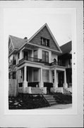 1031-33 S 10TH ST, a Queen Anne duplex, built in Milwaukee, Wisconsin in 1897.