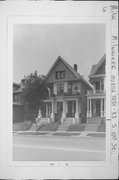 1031-33 S 10TH ST, a Queen Anne duplex, built in Milwaukee, Wisconsin in 1897.