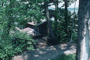 GOV'T LOT #6/RED CEDAR LAKE, a Rustic Style boat house, built in Cedar Lake, Wisconsin in 1912.