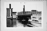 Over the Milwaukee River between N. Young Street and E. Pittsburgh Avenue, a NA (unknown or not a building) moveable bridge, built in Milwaukee, Wisconsin in 1982.