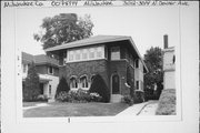 3012-3014 N DOWNER AVE, a Prairie School duplex/two-flat, built in Milwaukee, Wisconsin in 1925.