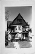 2437-39 S HOWELL AVE, a Queen Anne duplex, built in Milwaukee, Wisconsin in 1902.