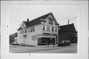 1534 W MITCHELL ST, a Queen Anne retail building, built in Milwaukee, Wisconsin in 1902.