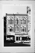 704-708 N MILWAUKEE ST, a Italianate retail building, built in Milwaukee, Wisconsin in 1866.