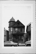1433-35 W SCOTT ST, a Queen Anne duplex, built in Milwaukee, Wisconsin in 1895.