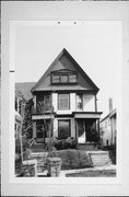 1708-10 E THOMAS, a Queen Anne duplex, built in Milwaukee, Wisconsin in 1899.