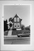 1617-17A N VAN BUREN, a Early Gothic Revival duplex, built in Milwaukee, Wisconsin in 1947.