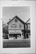 2108-10 W WELLS ST, a Front Gabled retail building, built in Milwaukee, Wisconsin in .