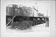 RR over Menomonee River, E of Harwood Ave., a NA (unknown or not a building) pony truss bridge, built in Wauwatosa, Wisconsin in 1909.