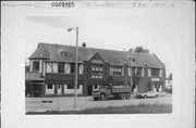 7707 W STATE ST & 7700 HARWOOD AVE, a English Revival Styles small retail building, built in Wauwatosa, Wisconsin in 1924.
