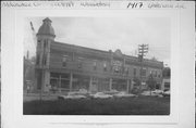 1409, 1417, 1421, 1423, 1425 UNDERWOOD AVE & 722 W STATE ST, a Queen Anne small retail building, built in Wauwatosa, Wisconsin in 1897.