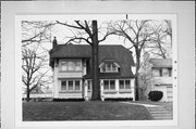 6742 W WISCONSIN AVE, a Arts and Crafts house, built in Wauwatosa, Wisconsin in 1903.