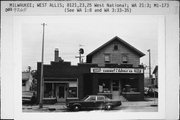 8121-8125 W NATIONAL AVE, a Front Gabled retail building, built in West Allis, Wisconsin in 1900.