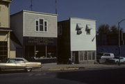 26 E MAIN ST, a Commercial Vernacular small retail building, built in Evansville, Wisconsin in 1883.