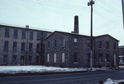 220 N FRANKLIN ST, a Astylistic Utilitarian Building mill, built in Janesville, Wisconsin in 1874.