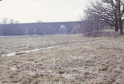 NORTHWESTERN RAILROAD TRACKS OVER TURTLE CREEK, a NA (unknown or not a building) stone arch bridge, built in Turtle, Wisconsin in 1869.