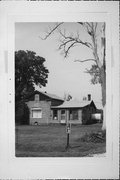 NORTH SIDE OF BELOIT-NEWARK RD, C. 1 MILE WEST OF NELSON RD, a Greek Revival house, built in Avon, Wisconsin in 1850.