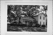SOUTH SIDE OF FINLEY RD, C. 1/4 MILE WEST OF AFTON RD, a Gabled Ell house, built in Beloit, Wisconsin in 1860.
