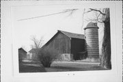 WEST SIDE OF M, C. 1/8 MILE SOUTH OF COON ISLAND RD, a Astylistic Utilitarian Building barn, built in Magnolia, Wisconsin in 1900.