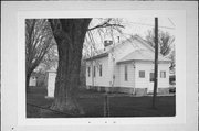 NORTH SIDE OF COUNTY HIGHWAY B, C. 1/8 MILE EAST OF COON ISLAND RD, a Front Gabled one to six room school, built in Center, Wisconsin in 1867.