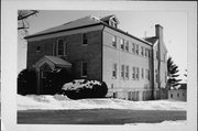 COUNTY HIGHWAY F, a Neoclassical/Beaux Arts live-in care facility/sanitarium, built in Janesville, Wisconsin in 1925.