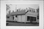 6421 W US HWY 14, a Boomtown retail building, built in Janesville, Wisconsin in 1890.