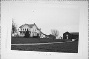 NORTH SIDE OF 11, NORTHEAST CORNER WITH PAHL, a Italianate house, built in Janesville, Wisconsin in 1870.