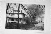 EAST SIDE OF GROVE RD, 1/2 MILE SOUTH OF SIX CORNERS RD, FIRE NO. 84, a American Foursquare house, built in Johnstown, Wisconsin in 1900.