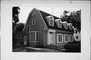 829 COLLEGE, a Dutch Colonial Revival house, built in Beloit, Wisconsin in 1928.