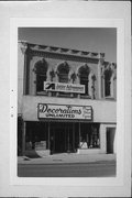 110 W GRAND AVE, a Italianate small retail building, built in Beloit, Wisconsin in 1880.