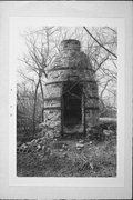 SW CORNER OF 51 AND JACOBS RD, a Astylistic Utilitarian Building lime kiln, built in Albion, Wisconsin in 1888.