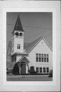 W SIDE OF HENRY ST, a Queen Anne church, built in Edgerton, Wisconsin in 1890.