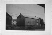 N LAWTON, 2ND E OF FLEA MARKET, a Astylistic Utilitarian Building warehouse, built in Edgerton, Wisconsin in 1882.