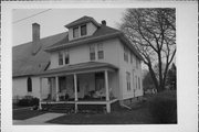 44 N 1ST ST, a American Foursquare rectory/parsonage, built in Evansville, Wisconsin in 1907.