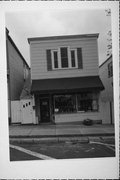 26 E MAIN ST, a Commercial Vernacular small retail building, built in Evansville, Wisconsin in 1883.